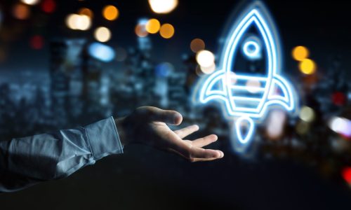 Man hand using startup digital neon interface 3D rendering Man hand on dark background using startup digital neon interface 3D rendering