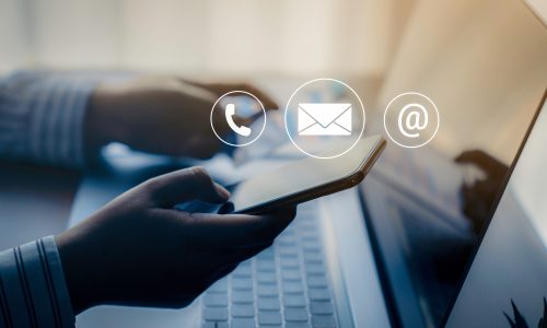 Contact us or Customer support hotline people connect. Businessm Contact us or Customer support hotline people connect. Businessman using a mobile phone with the (email, call phone, mail) icons.